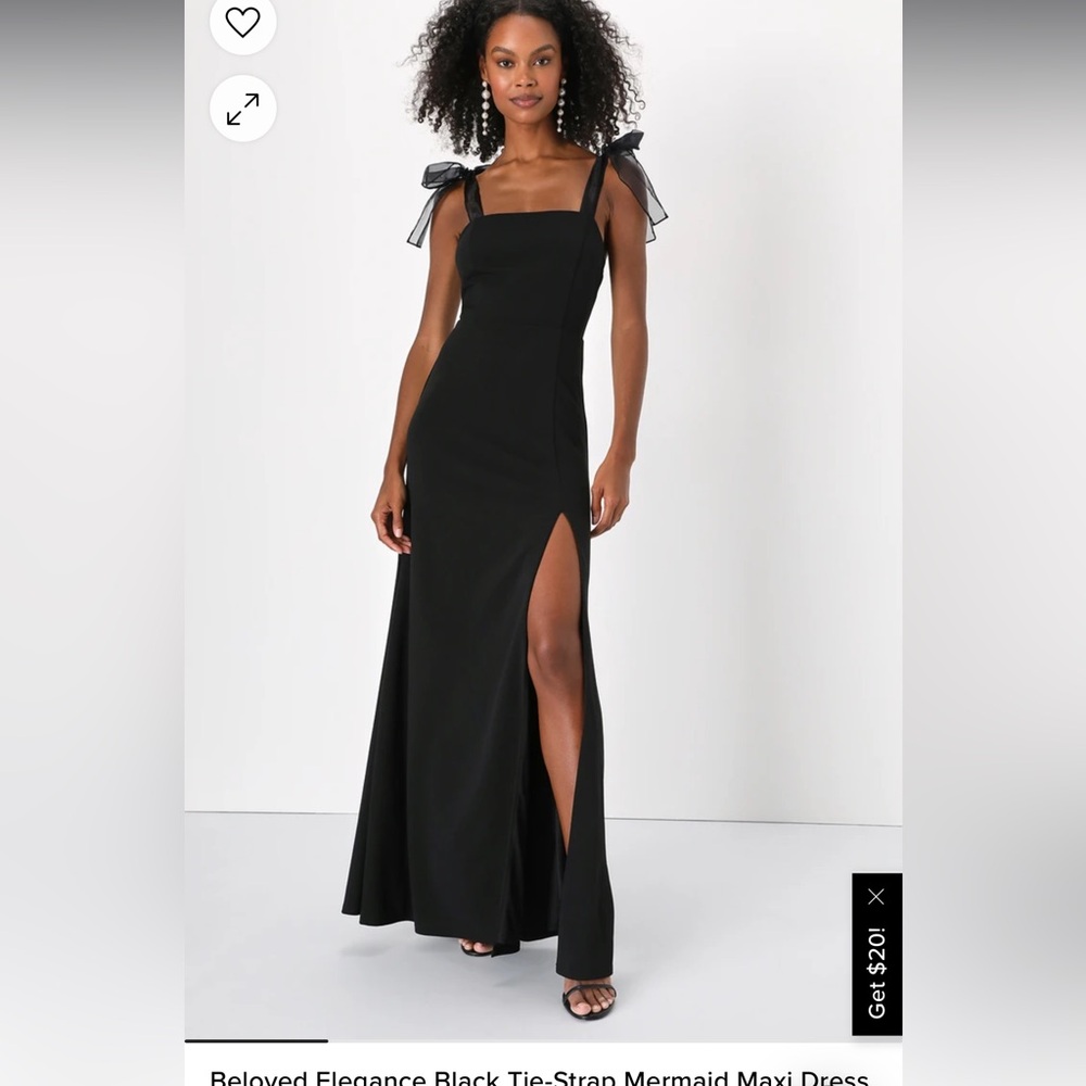 Black dress with shoulder tie bows that add a pop of fun